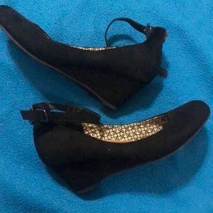 Black suede low wedge buckle